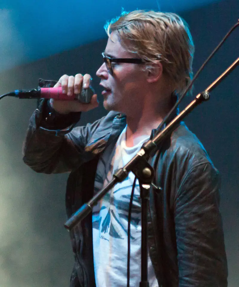 Macaulay Culkin singing on stage at Berlin Festival 2010 at Tempelhof Airport